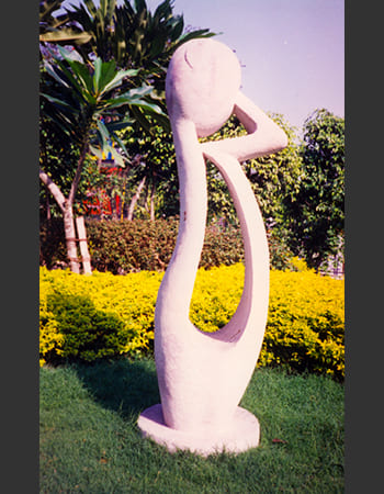 Modern abstract piece with curved forms and sophisticated stone carving artistry