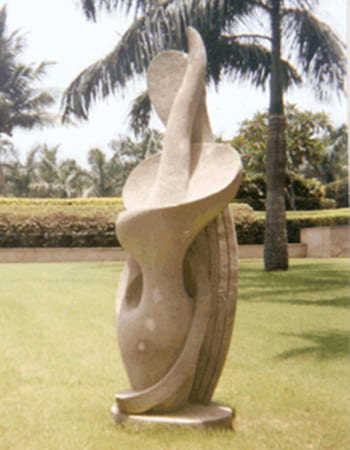 Abstract stone sculpture with flowing organic forms and contemporary artistic expression