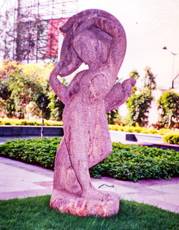 Contemporary abstract sculpture with elegant forms and polished stone finish