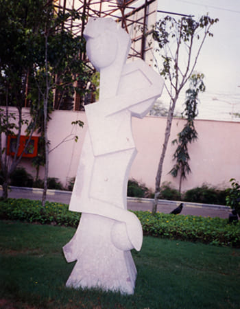 Corporate lobby stone carving featuring intricate architectural details and cultural motifs