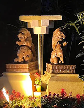 Luxury hotel stone fountain installation with decorative carved elements