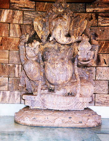 Luxury hotel stone fountain installation with decorative carved elements