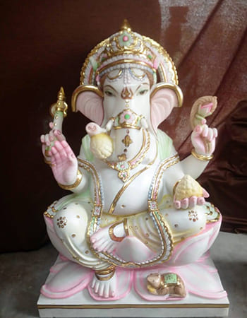 Intricately carved white marble Lord Jagannath idol with traditional Odisha temple motifs and smooth polished finish