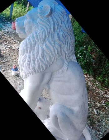 Exquisite pink marble Ganesha sculpture with traditional trunk positioning and ornate carved base from Dhenkanal marble