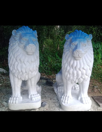 Graceful marble Krishna sculpture with flute and traditional posture showcasing smooth Odisha marble finishing techniques